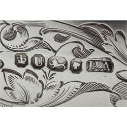 Victorian silver lidded trinket box, with embossed decoration by John Edward Wilmot, Birmingham 1900, silver bladed knife and fork with mother of pearl handles by Atkin Brothers, Sheffield 1862 and an embossed silver dish hallmarked (4)