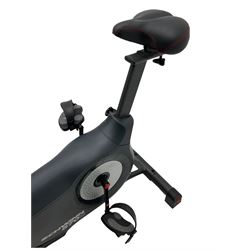 Schwinn 570U cycling type exercise machine with instruction manual and copy invoice dated 2019