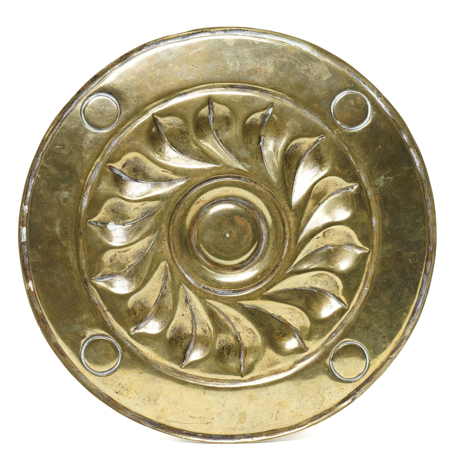 Central section of a 17th century Nuremberg brass alms dish, central rosette surrounded by Gothic inscription, intersected by roundels with engraved heads, D23cm 