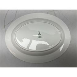 Royal Doulton tea and dinner wares in the Meadow Mist pattern, no H5007, comprising seven dinner plates, eight side plates, two lidded tureens, two jugs, lidded sucrier, oval serving dish, six teacups, seven saucers, seven tea plates and large saucer