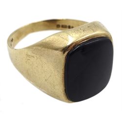 9ct gold black onyx signet ring and a silver curb link identity bracelet, both hallmarked London 1979 