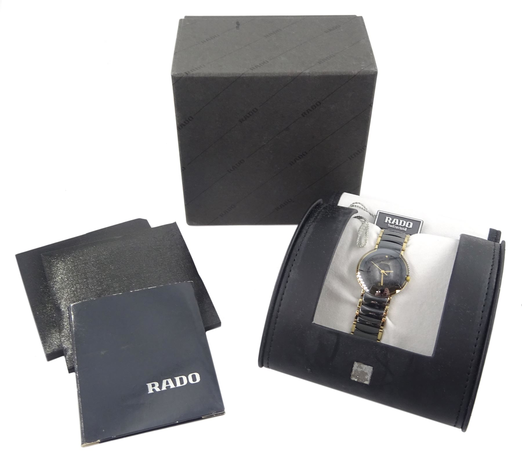 Rado Diastar ceramic wristwatch, Ref. 129.0301.3, on ceramic bracelet, boxed and a Rado Jubilé wristwatch, Ref. 129.3577.4N, diamond set dial, on original black leather strap with buckle, boxed with papers and guarantee dated 1990
