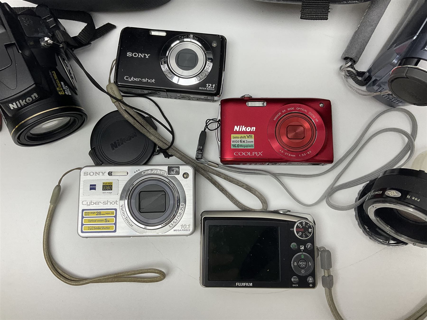 Nikon Coolpix 8700 camera body, serial no 3220838, with Zoom Nikkor Ed 8.9-71.2mm 1:2.8-4.2 lens, together with Canon digital video camcorder and other digital cameras and camera equipment