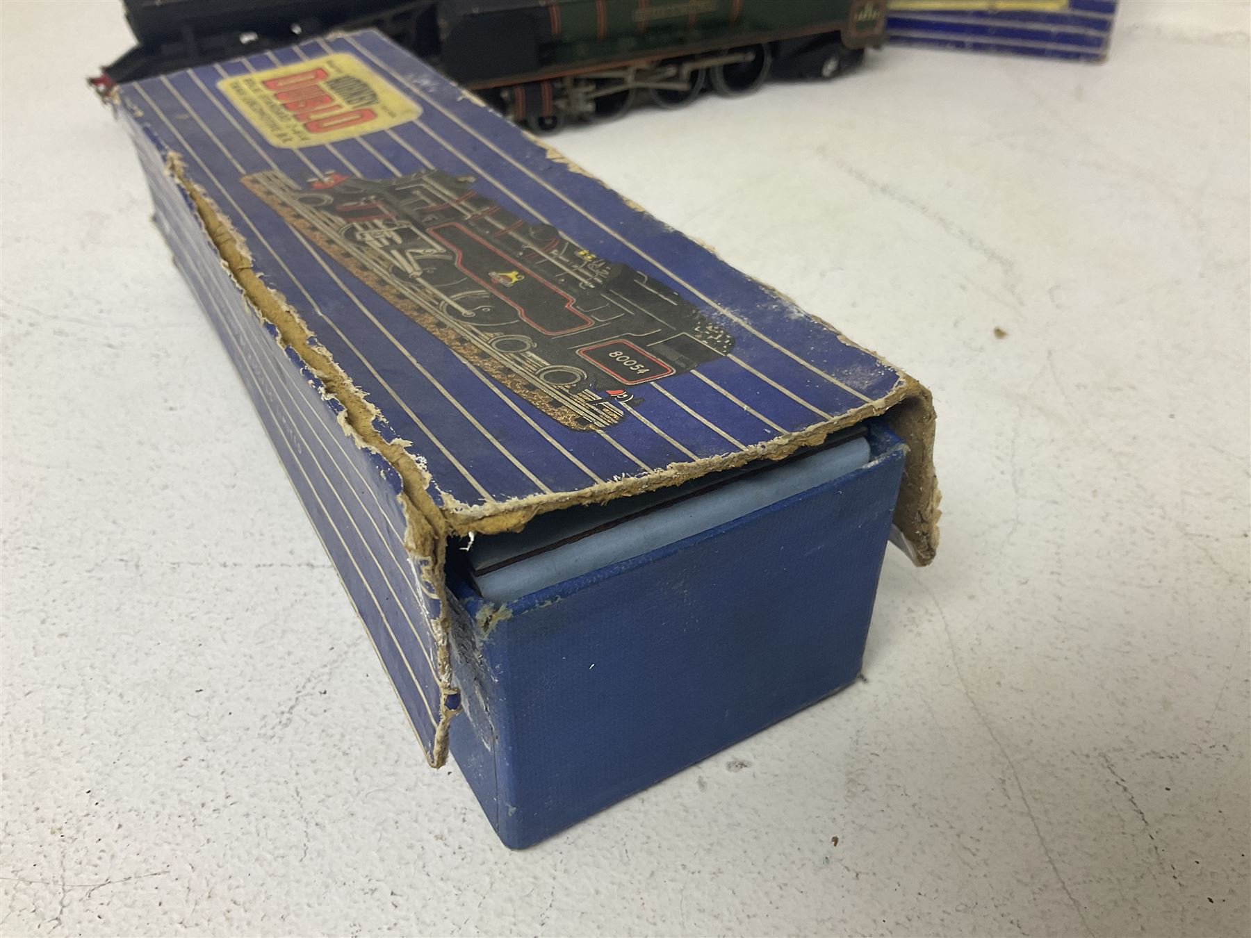 Hornby Dublo - 3-rail Class 8F 2-8-0 freight locomotive no.48158 with tender, Duchess Class 4-6-2 ‘Duchess of Montrose’ locomotive no.46232, Class 4MT Standard Tank 2-6-4 locomotive no.80054, all in original boxes; and Class N2 0-6-2 Tank locomotive no.69567, without box (4) 