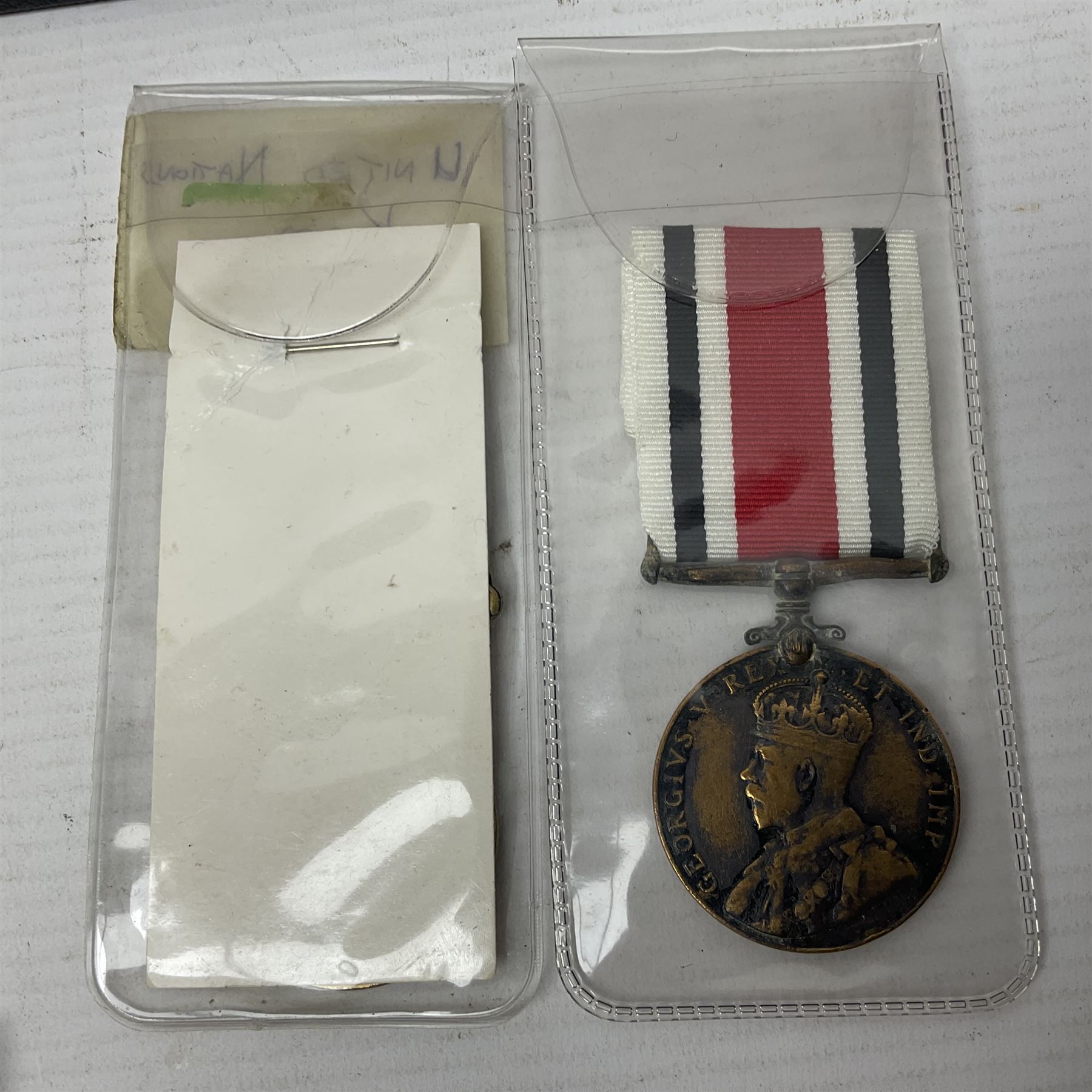 Two Imperial Service Medals to Elsie Hannah Ferguson and Fred Whitehead; each in original case; WWI Special Constabulary Medal to Inspr. Alfred W. Thompson; modern Prisoner of War Medal; cased; replica Victoria Cross and India Mutiny Medals with archive of information relating to Pte. Robert Newell V.C. 9th Lancers; replica Victoria Cross and George Cross with miniatures; and other replica medals etc