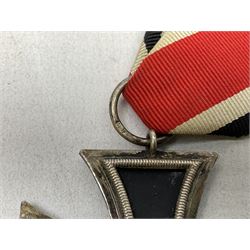 WW2 German Iron Cross 2nd Class with ribbon, ring stamped 44; and original issue packet; together with a copy of a WW2 Iron Cross