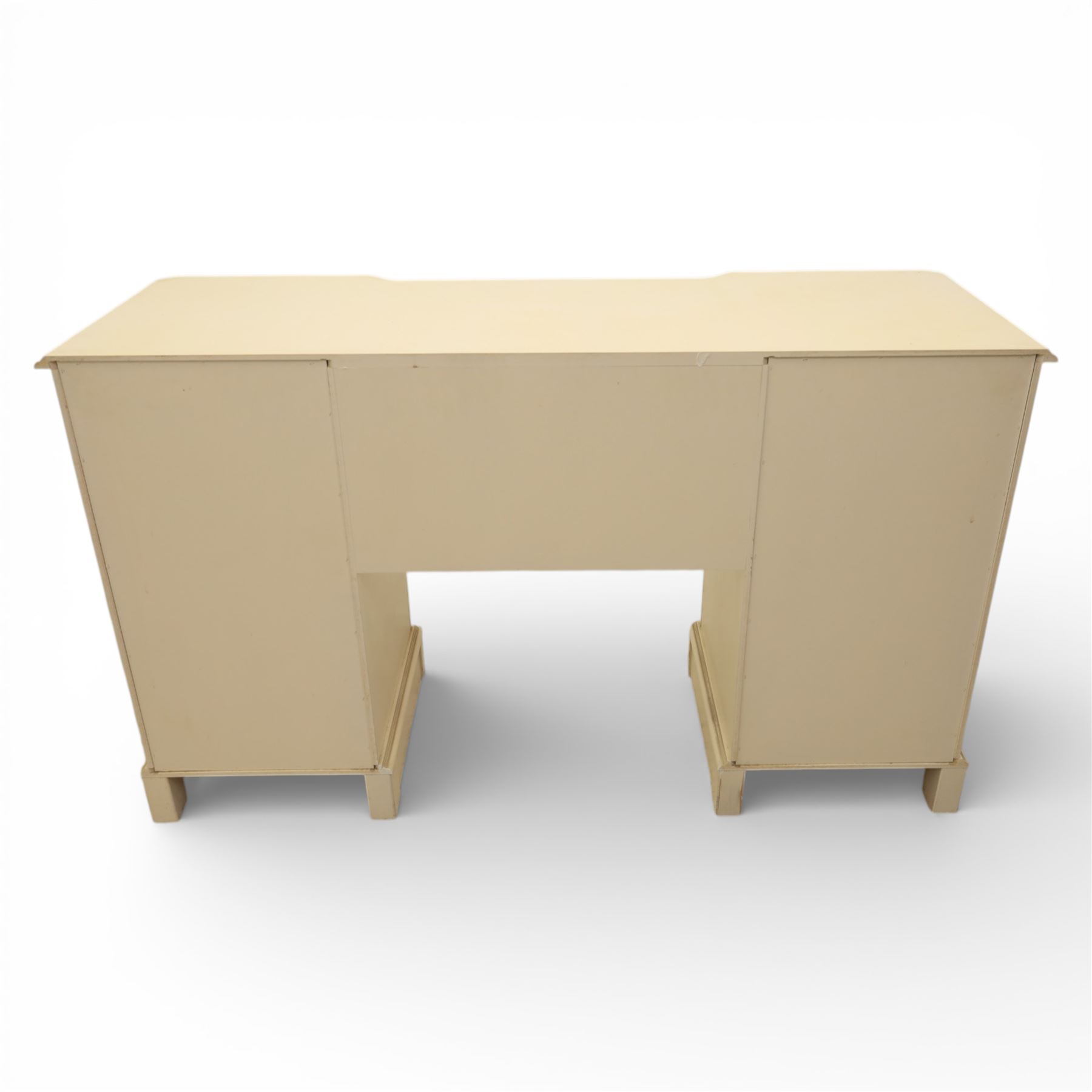 Contemporary French design white painted bedroom suite retailed by Barkers of Northallerton, comprising wide chest fitted with four short and four long drawers with oval brass handles (H 70cm, W 159cm, D 46cm), pair of bedside chests each fitted with three drawers (H 62cm, W 40cm, D 46cm), dressing table fitted with four short drawers and central kneehole with shaped apron (H 79cm, W 131cm, D 46cm) with matching framed wall mounted mirror (H 100cm, W 113cm), and full length standing mirror (H 175cm, W 73cm)