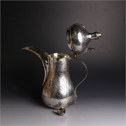 Middle Eastern silver coffee pot or Dallah, of baluster form with elongated spout and domed lid, with chased scrolling foliate decoration, the lid with applied silver plaque with presentation engraving, stamped 925 to base, H26.5cm