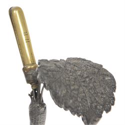 19th century silver plated desk holder, the circular naturalistically modelled base cast with fruiting vines and with applied figure of a ram, rising to a vine with two leaves, and initialled brass clip, H18cm