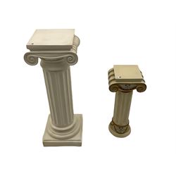 Classical Ionic style column in white finish with scrolled capital, fluted body on moulded plinth base (H97cm), and a similar small column stand (H68cm)