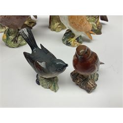 Collection twenty one of Beswick bird figures, to include Lapwing no 2416, Kingfisher no 2671, Red Pigeon 1383, Cuckoo no 2315, Nuthatch no 2418 etc