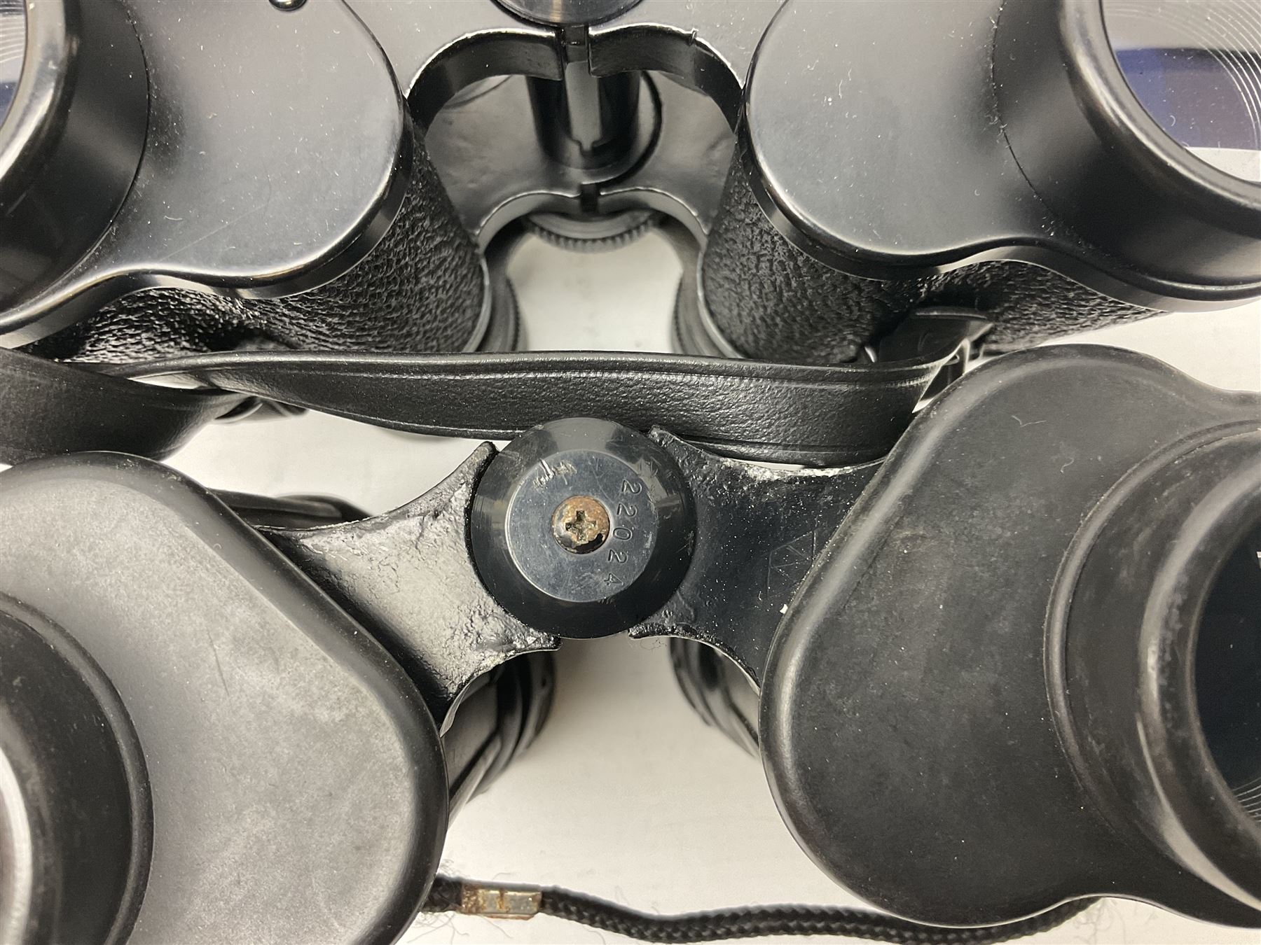 Eleven pairs of binoculars to include Lieberman & Gortz 20x65, Stem (USSR) 7x50, Helios 10x50 Field, Prinz 12x50, Tasco 8x40, Tasco 10x50, etc