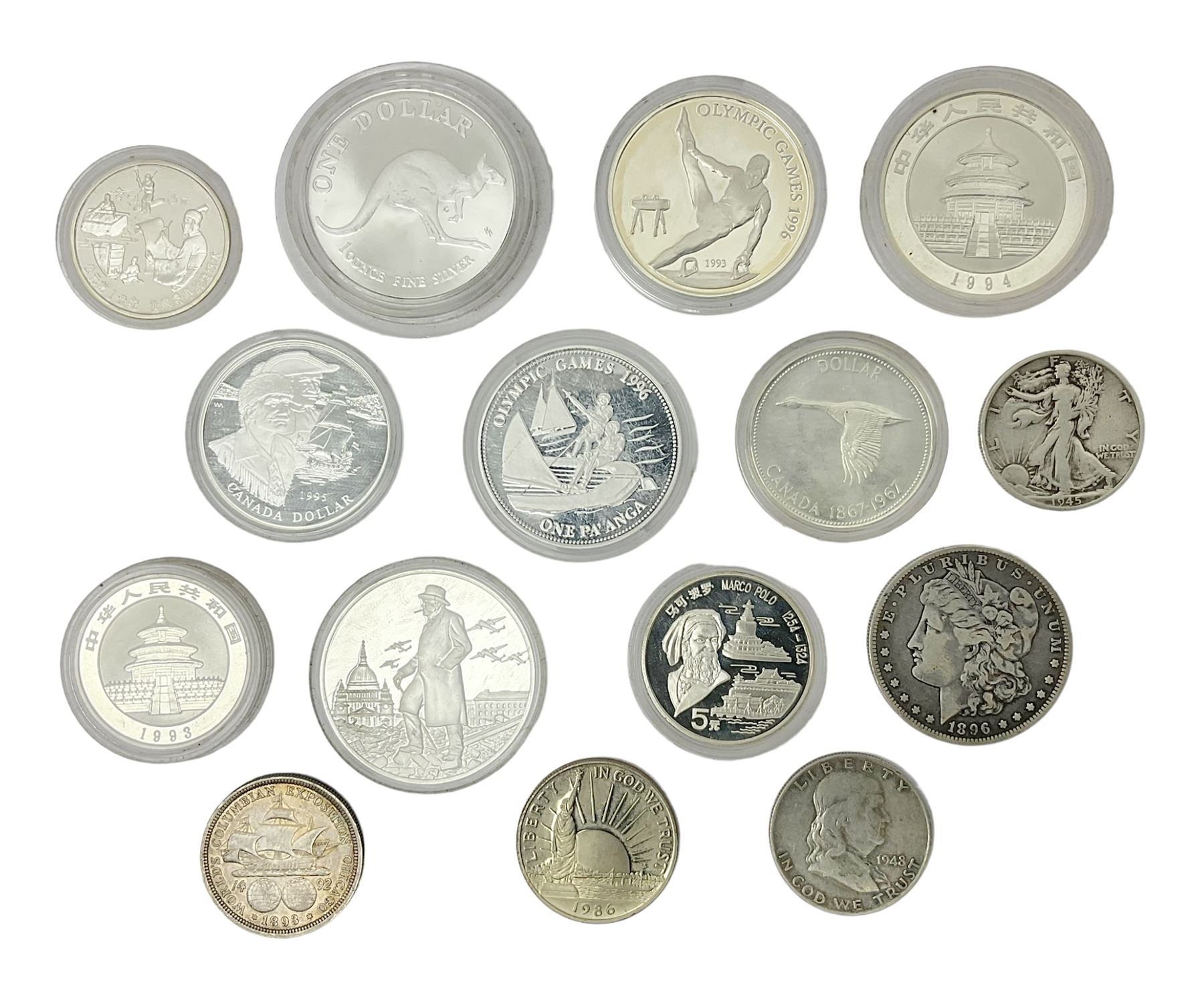 United States of America 1896 Morgan one dollar coin, 1893 'Columbian Exposition' commemorative half dollar, 1945 standing Liberty half dollar, Queen Elizabeth II Australia 1993 one ounce fine silver dollar, Canada 1967 and 1995 one dollar coins etc (15)