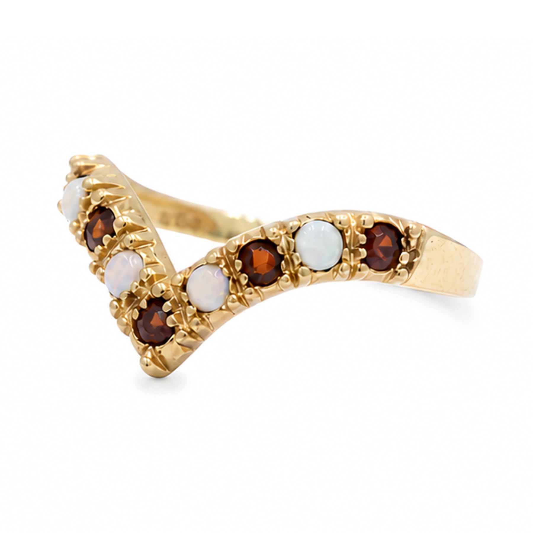 9ct gold garnet and opal wishbone ring, set with alternate round cut garnets and cabochon cut opals, London 1980