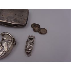 Group of novelty silver items, comprising man in the moon vesta case, perfume pendant and a whistle, unmarked but test silver, together with a mother of pearl handled silver fruit knife, silver cigarette case, both hallmarked and a small quantity of silver threepences