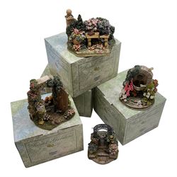 Four Lilliput Lane models, from the Secret Gardens collection, comprising Nature's Doorway, Fruits of Eden, Picnic Paradise and Peaceful Pastimes, all boxed 