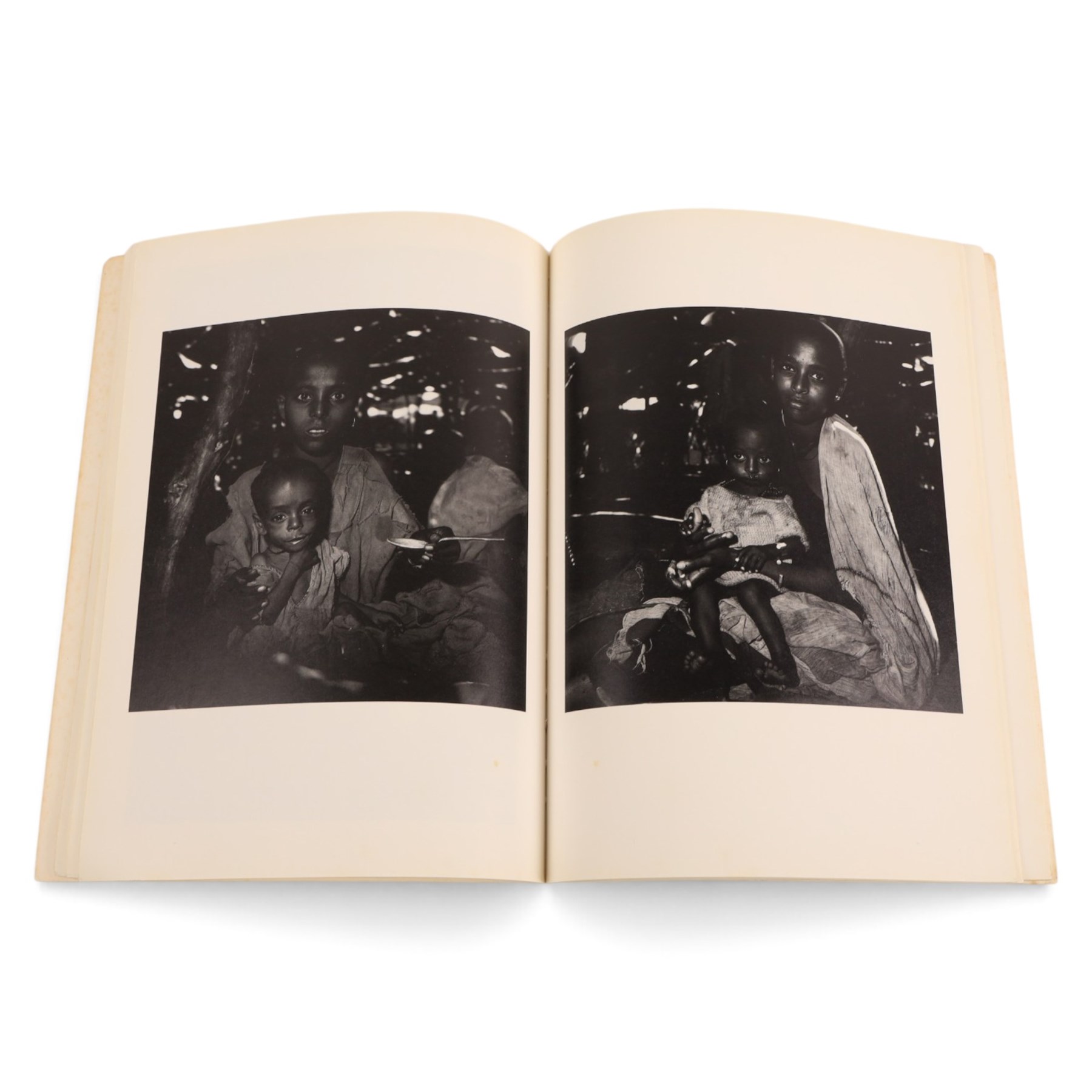 Two books by photographer David Bailey (British 1938-), to include signed first edition 'Nudes 1981-1984' hardback and 'Imagine - a Book for Band Aid' paperback; together with 'Bailey's Box of Postcards - National Portrait Gallery'