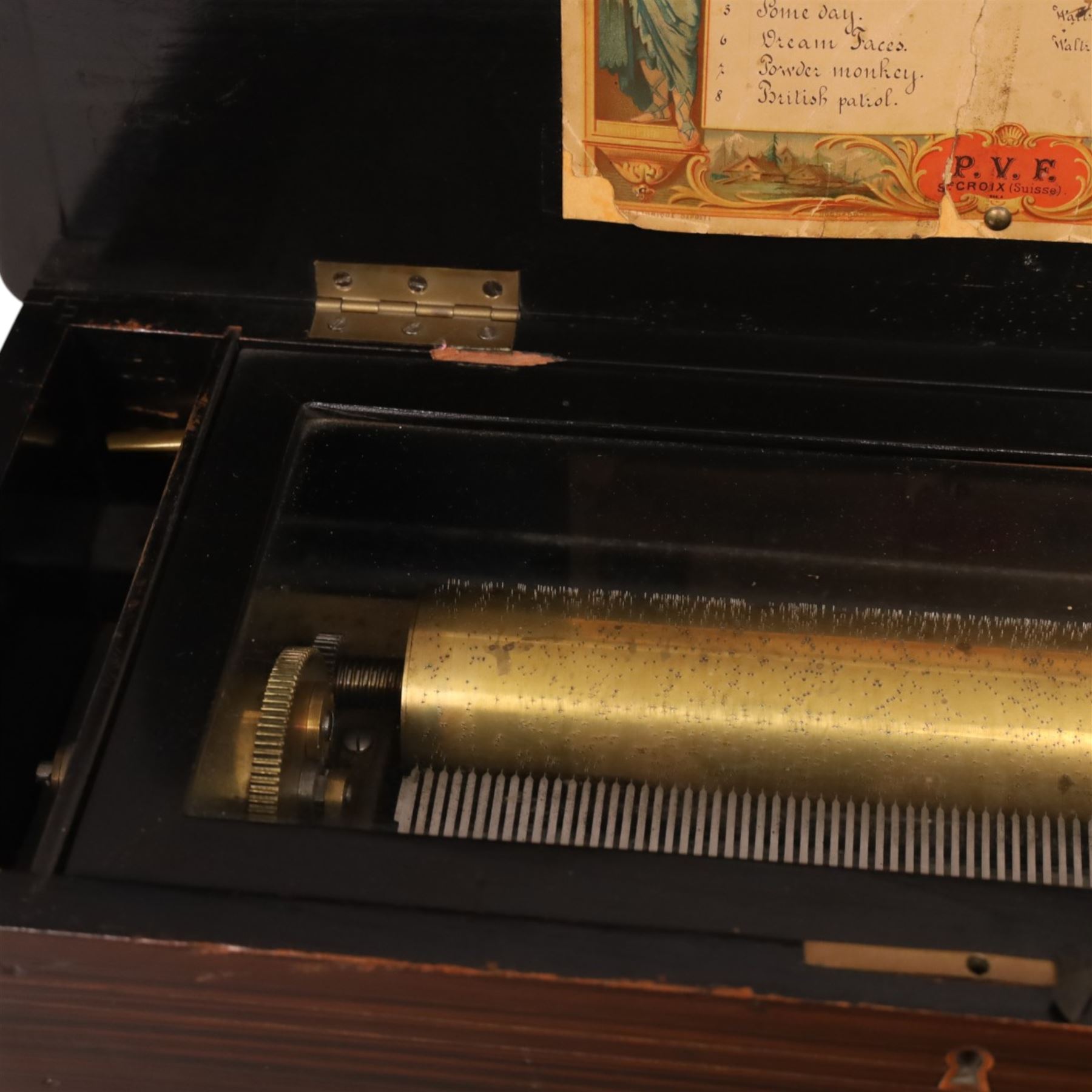 Swiss-Late 19th-century inlaid rosewood musical box playing eight airs, 78 tooth steel comb and brass cylinder, crank operated going barrel with a jewelled governor, with original tune sheet, W51cm 