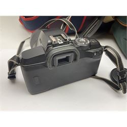 Cameras and accessories, to include Olympus OM101 Power Focus camera body, serial no 1076067, with 'Sigma AF Zoom 1:38, f=75 200mm' lens, serial no 2053714, Canon EOS 5000 camera body, serial no 1507812, with 'Canon Zoom EF 80-200mm, 1:4.5-5.6' lens, other cameras, by Miranda, Coronet and Ricoh and a collection of lenses, carry cases, etc 