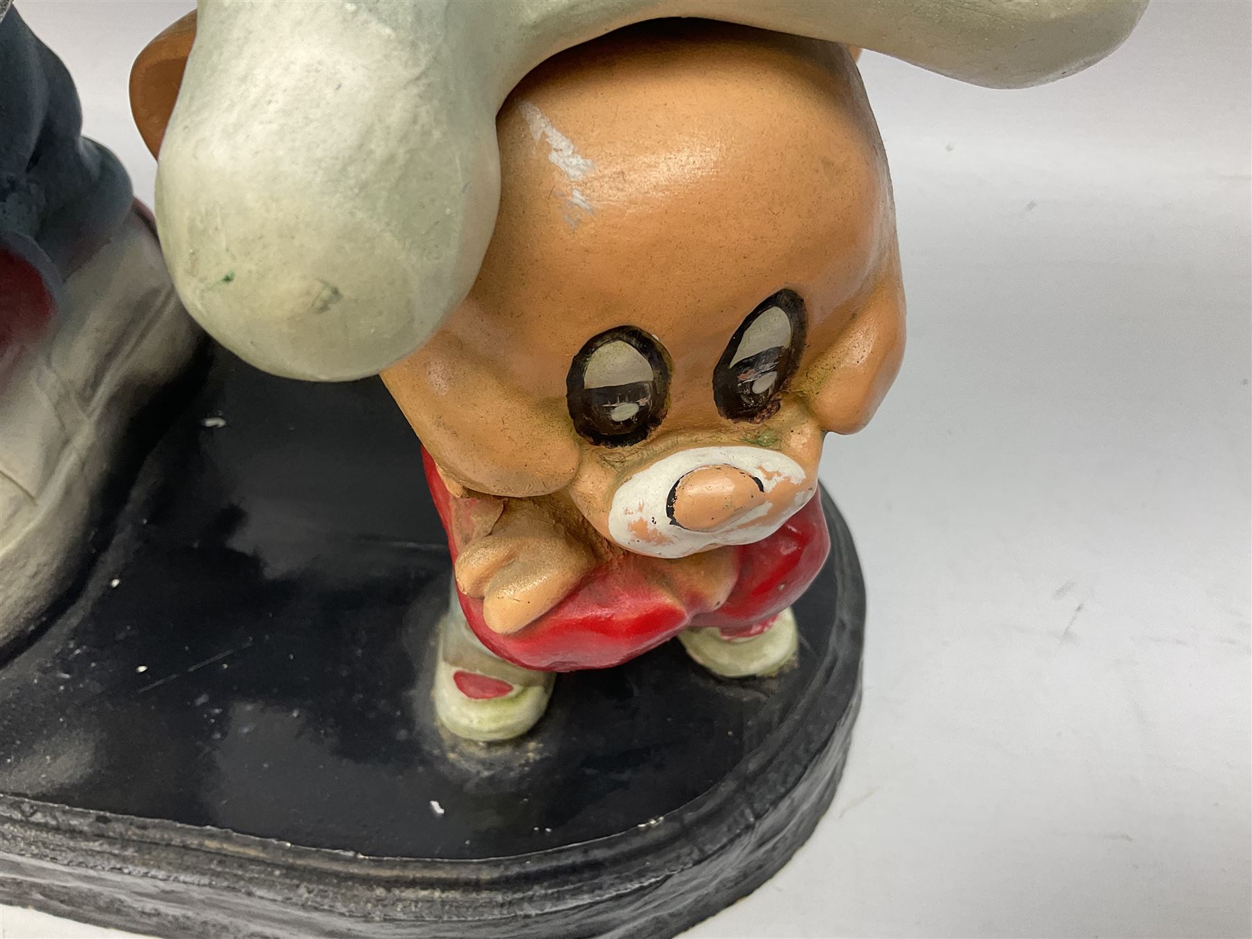 Fibreglass promotional/advertising group of Tom & Jerry, Tom standing wearing a blue track suit with his left hand resting on Jerry's head H63cm