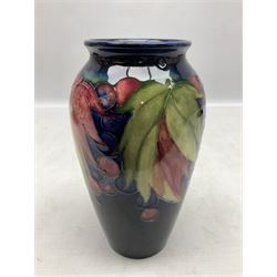 Moorcroft vase of baluster from, decorated with Leaf and Berry pattern, with impressed and painted marks beneath, H19cm
