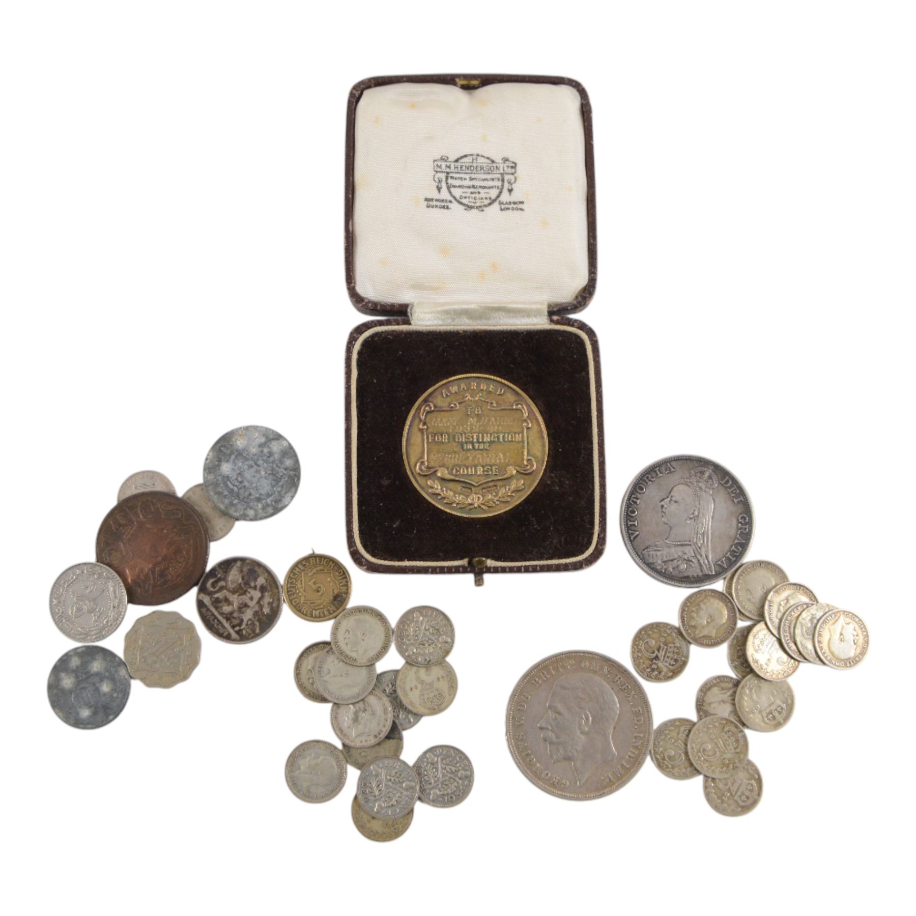 Approximately 42 grams of Great British pre-1920 and approximately 44 grams of pre-1947 silver coins, together with a silver Diploma medallion and some further coins