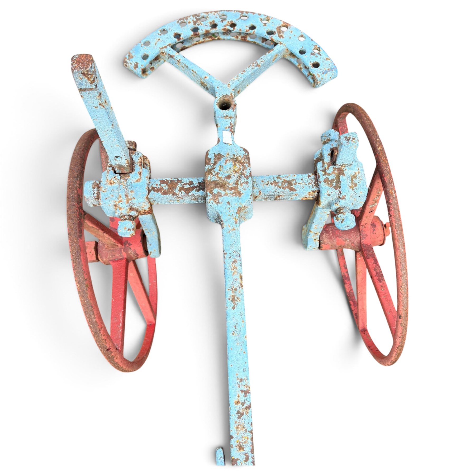 J. & F. Howard Ltd., Bedford - late 19th/early 20th century blue-painted cast iron horse-drawn potato ridger, with twin handles above a curved beam, adjustable ridging body and ploughshare, on red-painted five-spoke wheels, signed HOWARD BEDFORD