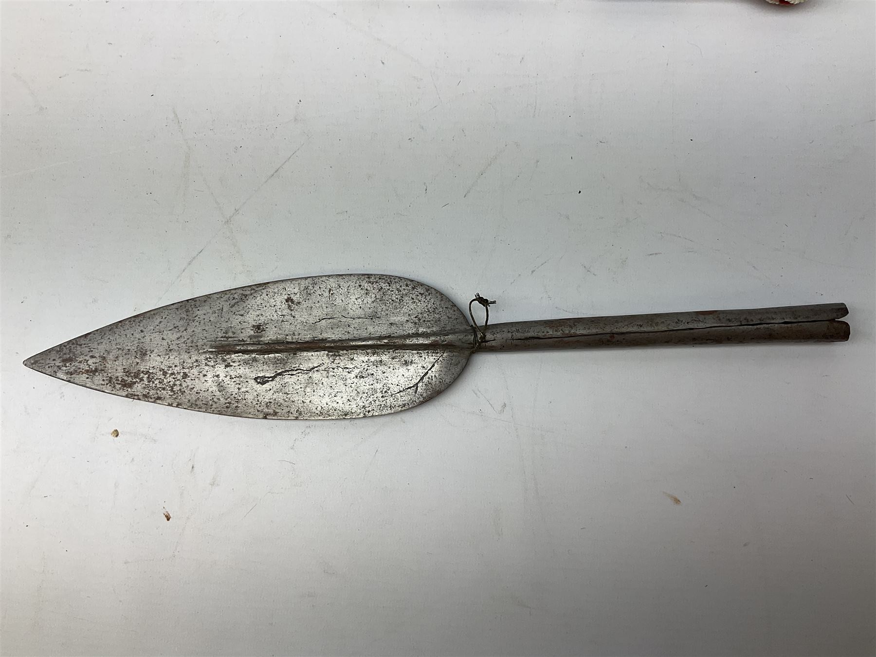 Miscellaneous items including two native ceremonial maces; steel spear head; pair of chrome plated spurs by Geo. Parker & Sons; WW1 French & Son marching compass leather case; scissor action bullet mould etc