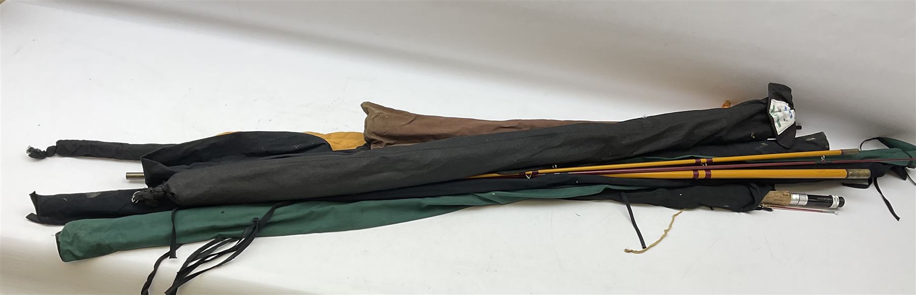 Quantity of fly and sea fishing rods and accessories, to include Shakespeare Boat 210 rod, Daiwa rod and others, and Guang Zhao FLD9000 course fishing reel, Beachmaster 7000FD, Rimfly II amd Penn Super Mariner, tackle etc