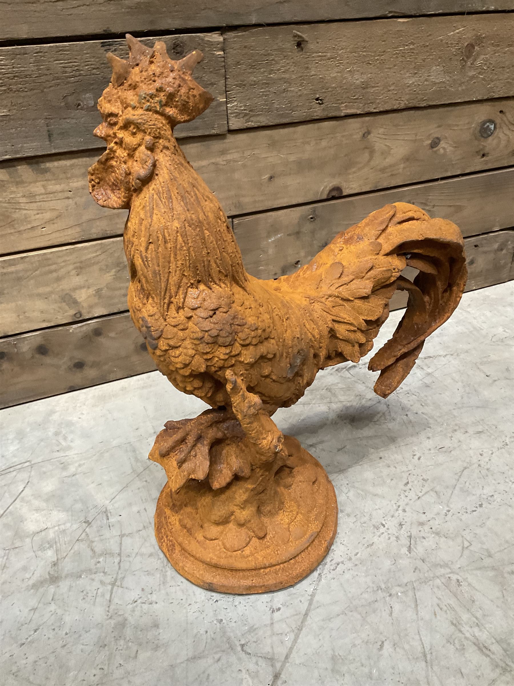 Small weathered cast iron garden cockerel