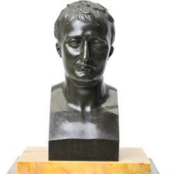 French-First quarter 19th century 8-day sienna marble and bronze-mounted mantel clock of rectangular architectural form, with patinated foliate guilloche pattern cast bronze mounts  in richly figured sienna marble, surmounted a by a classical patinated bronze bust of Napoleon Bonaparte, above a gilt engine turned dial with Roman numerals and blued steel hands, with a twin train Parisian countwheel striking movement, striking the hours and half-hours on a bell, silk suspension with thumb-screw adjustment. With pendulum.