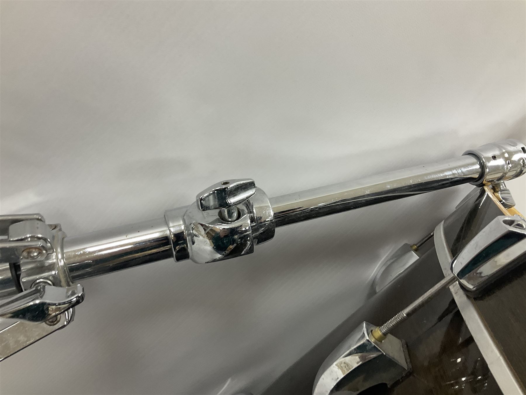 Pearl Vision SST Birch Ply shell four-piece drum kit in black comprising bass drum with foot pedal and three graduated toms; together with Pearl Custom Alloy Sensitone steel snare drum, drum and cymbal stands, microphone stand, stool and various drum sticks 