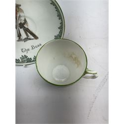 Early 20th century Royal Doulton teacup and saucer, from the series 'The All Black Team', the teacup depicting a cricketer entitled 'Good for fifty', the saucer depicting a cricketer stood in a long coat and wide brimmed hat, entitled 'The Boss', both with printed mark beneath, cup H6.5cm