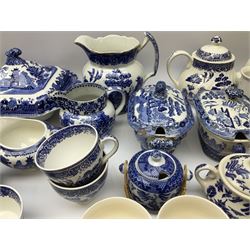 Blue and white Willow pattern ceramics to include dinner wares and tea wares such as lidded tureens, dinner plates, teapots, jugs etc by Burleigh Ware, Churchill and Booths etc