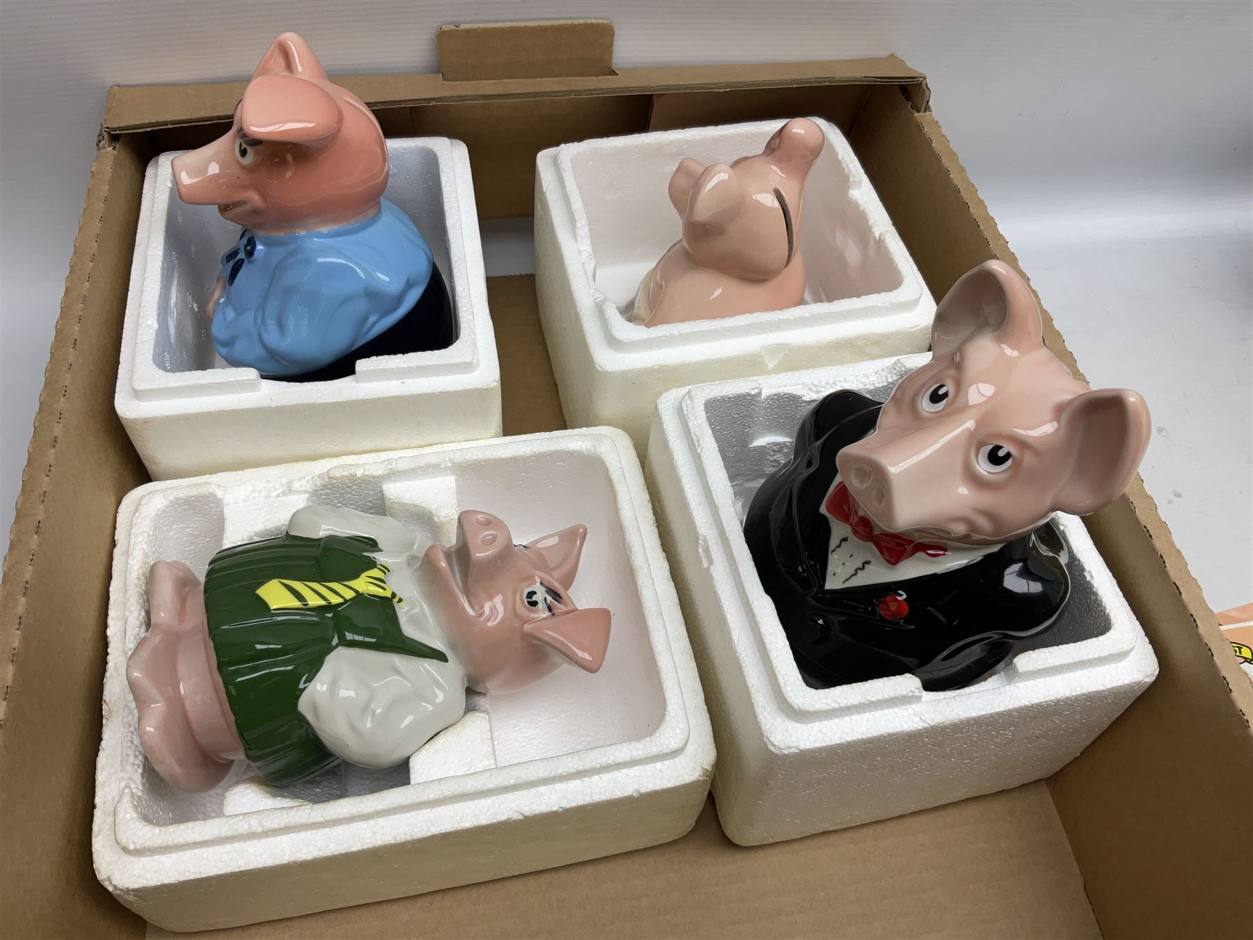 Set of five Wade NatWest money boxes, comprising father, mother, boy, girl and baby, four with original boxes 