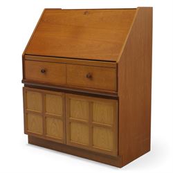 Parker Knoll - teak bureau, sloped fall front enclosing fitted interior, over two short drawers and two panelled cupboard doors