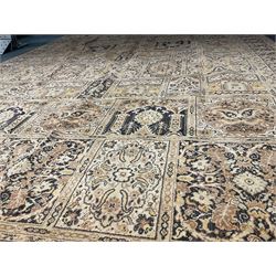 Large Persian design beige ground carpet, repeating border