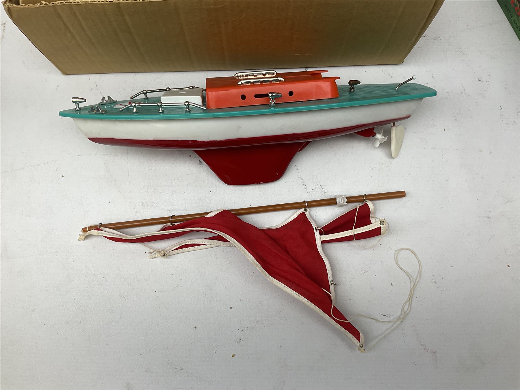Five model boats - Sutcliffe clockwork Tiger Speedboat; boxed; Motor Sailor battery operated yacht; boxed; Waterline battery operated police launch; boxed; and Tri-ang Scalex 'Aberdeen' North Sea Drifter; boxed, with another similar unboxed (5)