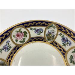 19th Sèvres style porcelain cup and saucer, the cup painted with a figural scene, against a scalloped border of scrolling floral swags on a blue ground, together with a Sèvres soft paste porcelain coffee can and saucer, painted with panels of exotic birds, roses and a border of cornflowers, LL monogram enclosing date letters H above painters mark, coffee can H6.5cm, saucer D13.5cm (2)