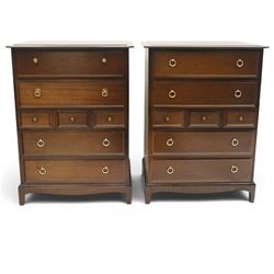 Stag Minstrel - pair of mahogany combination chests, fitted with an assortment of seven dr...