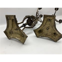 Pair of 20th century bronze effect four light candelabras, modelled in the Grand Tour style, each with stepped trefoil base leading to three paw legs cast with masks and palmettes and surmounted by zoomorphic figures, encasing a central turned column supporting a central stem with socket above drip pan, and three scrolling arms with conforming sockets and arms, H63cm