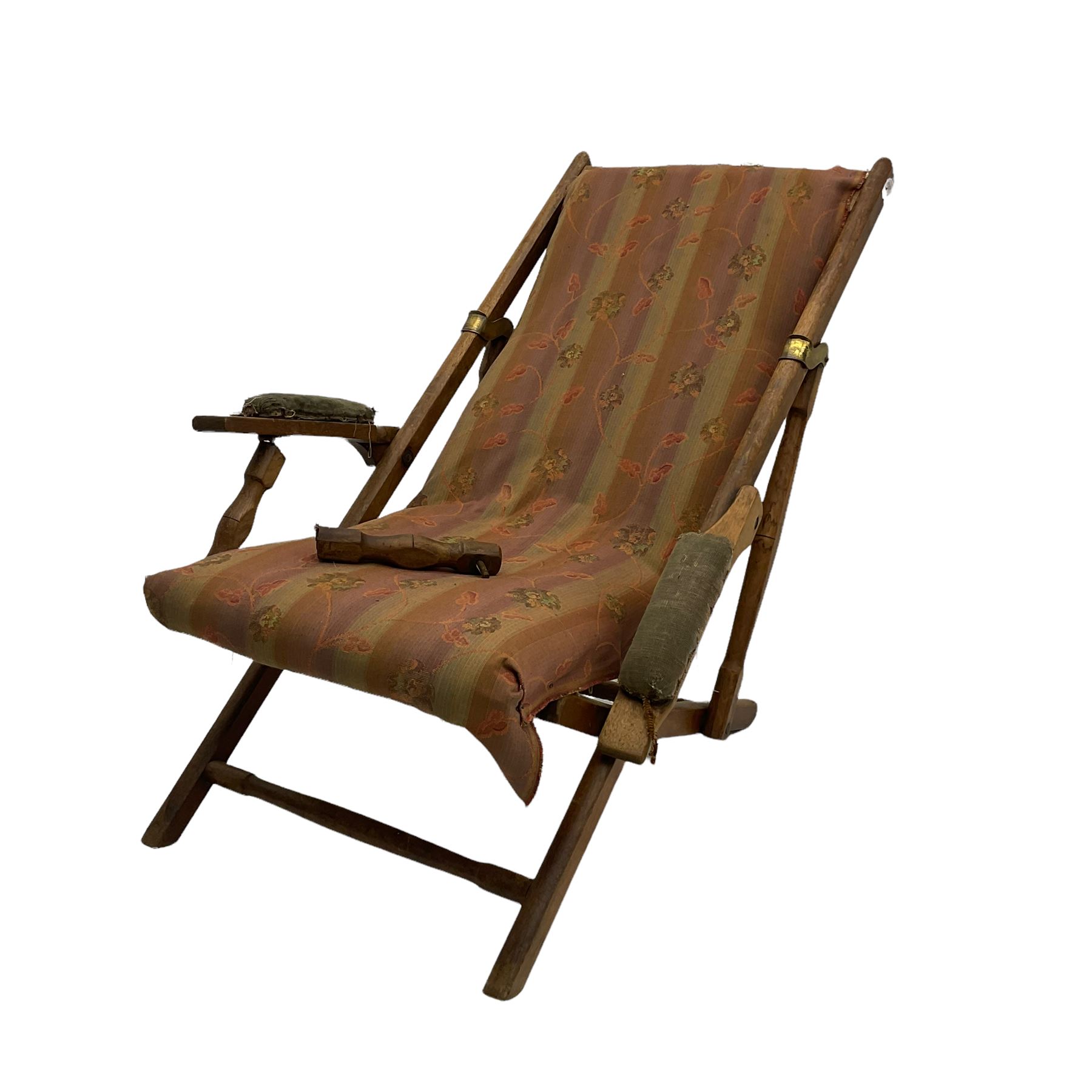 19th century teak campaign steamer or garden chair, folding staggered mechanism with brass fittings, upholstered seat, back and arms