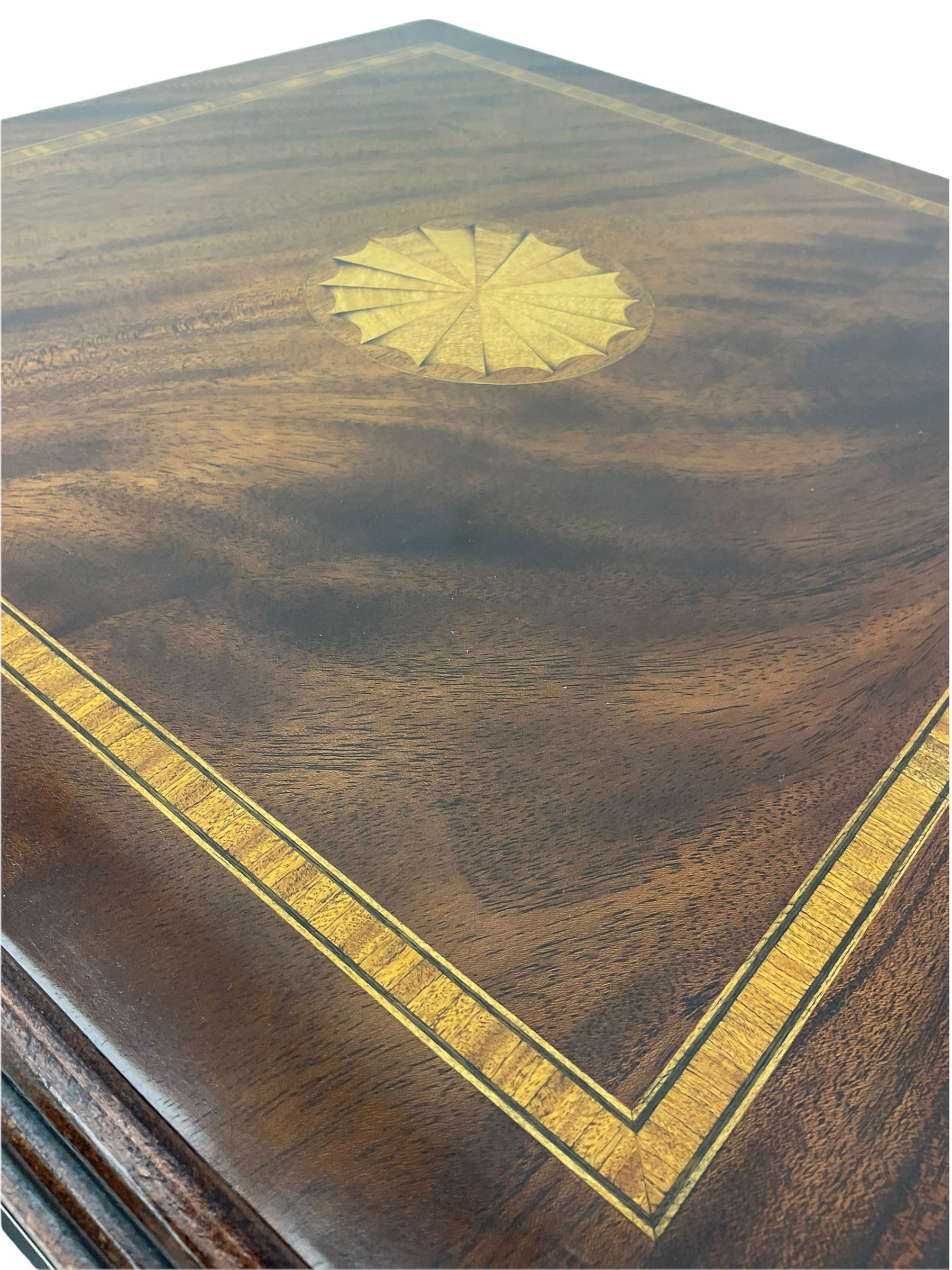 20th century mahogany revolving bookcase, inlaid centre motif, satinwood banded border