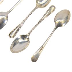 Danish silver demitasse spoon, stamped Georg Jensen, Sterling, Denmark, together with two sets of early 20th century silver coffee spoons, all hallmarked
