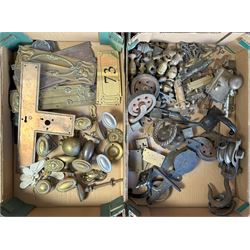 Collection of mainly early 20th century door furniture, to include Art Nouveau brass finge...