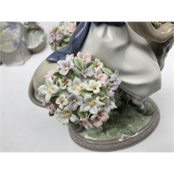 Four Lladro figures, comprising Look at Me, no 5465, Pocket Full of Wishes, no 7650, Valencian Girl no 1304, and Flower Songs no 7607, H26cm