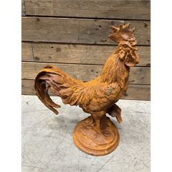 Small weathered cast iron garden cockerel