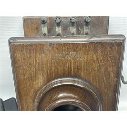 Collection of phone headsets, including GPO bakelite examples, together with other telephone parts 