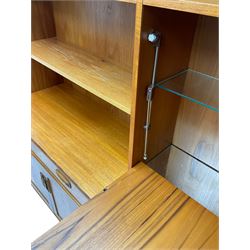 G-Plan - teak wall unit, raised display cabinet with shelves and fall front compartment, fitted with drawer, double cupboard and single cupboard below