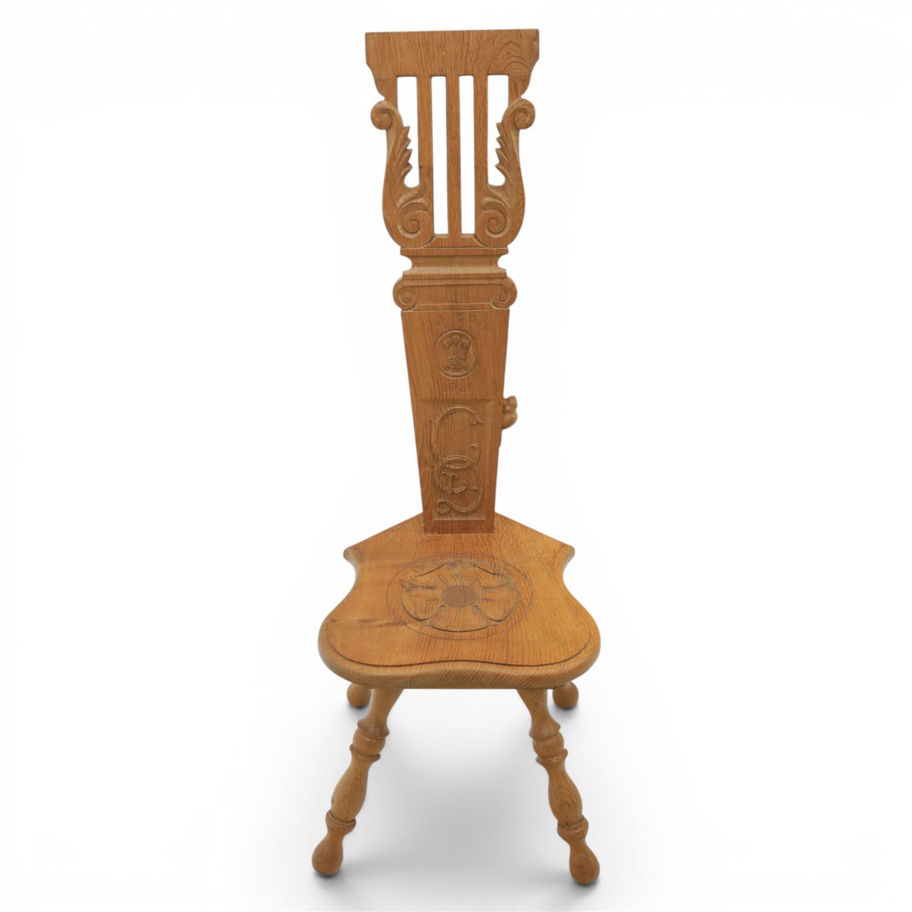Beaverman - Oak hall chair with commemorative carved back panel  dated '29th July, 1981' for Prince Charles and Princess Diana royal wedding, with carved Yorkshire rose and the Prince of Wales feathers, on turned supports, with carved beaver signature, by Colin Almack of Sutton near Thirsk